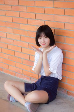 asia thai teen short hair White t-shirt beautiful girl smile and relax