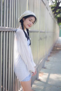 Asia thai teen blue dress güzel kız gülümse ve rahatla