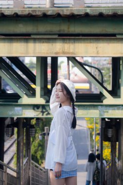 Asia thai teen blue dress güzel kız gülümse ve rahatla