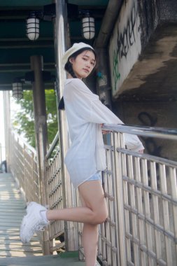 Asia thai teen blue dress güzel kız gülümse ve rahatla