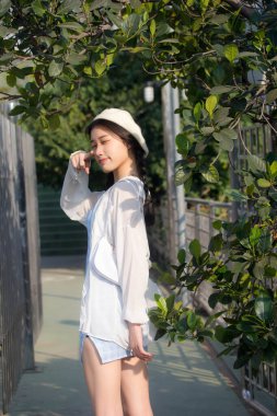 Asia thai teen blue dress güzel kız gülümse ve rahatla