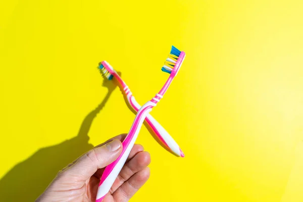 Holding Toothbrush Old New Toothbrushes Located Side Side Comparison — Stock Photo, Image