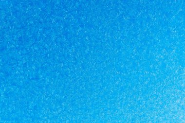 Cam bir arka planda mavi don. desenli buzlu cam..