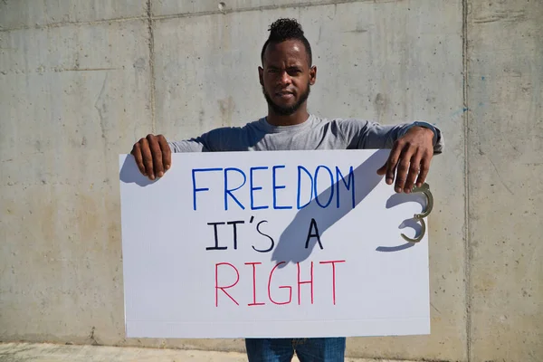 African American Man Holds Banner Reads Freedom Right Man Holds — Stock Photo, Image
