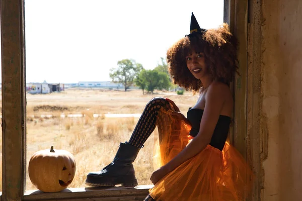 Beautiful Young African American Woman Dressed Witch Holding Halloween Pumpkin — Stock Photo, Image