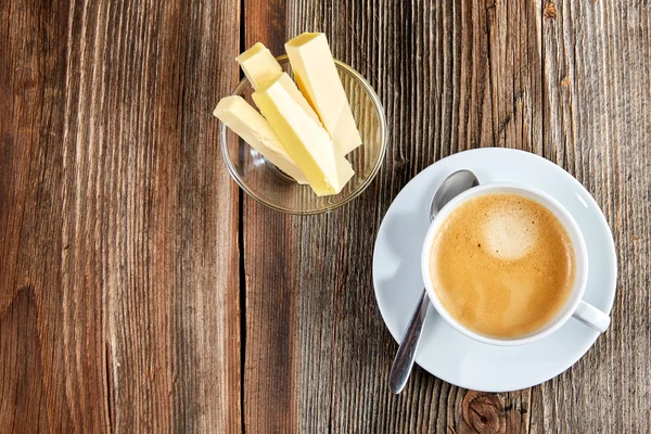 Bulletproof Coffee in a white cup — Stock Photo, Image