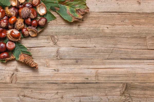 Chestnuts on a table — Stock Photo, Image
