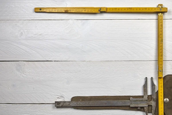 Scale ruler on a white table — Stock Photo, Image