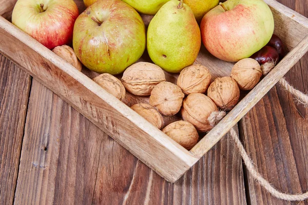 Apples and pears on a table