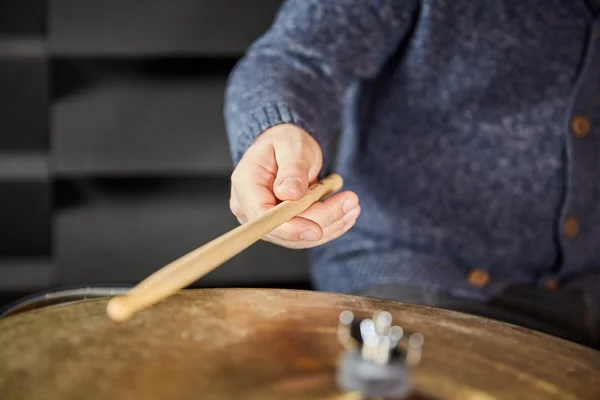 Drumstick and hand of drummer — Stock Photo, Image