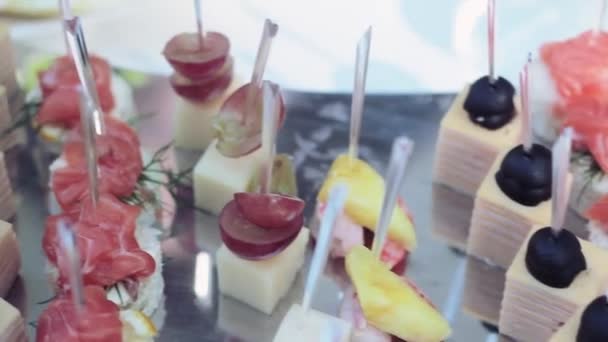 Canapes on holiday table. Wedding. — Stock Video