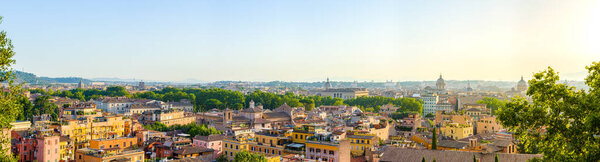 Panorama of Rome, Italy at sunrise from the Janiculum Hill terrace with Trastevere district, Villa Medici, Spanish Steps, Pantheon, Victor Emmanuel monument, Campo de Fiori, church cupolas and historic city center