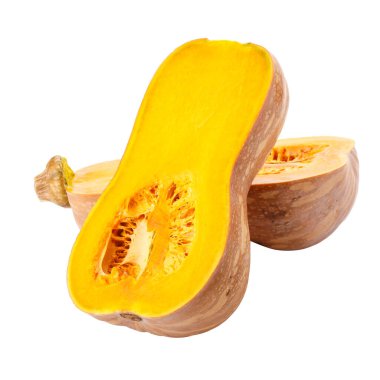 Balkabağı ezmesi beyaz arka planda izole edilmiş parçalara bölünmüş.