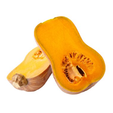 Balkabağı ezmesi beyaz arka planda izole edilmiş parçalara bölünmüş.