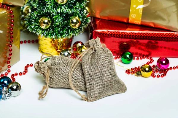 Two Linen Bags Gift Boxes Christmas Decorations Background Studio Shot — Stock Photo, Image