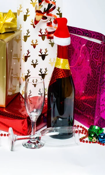 Christmas Tree Champagne Bottle Red Santa Claus Hat Boxes Gifts — Stock Photo, Image