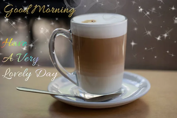 a glass of cappuccino on the table with blurred background. Glass, ceramic white hot drinks. Cup of coffee in coffee shop blurry. Good Morning Quotes With Images and Good Morning Messages