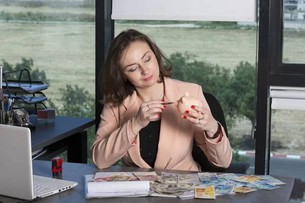 Beautiful Woman Piggy Bank Saving Money Pen Her Hands Sitting — Stock Photo, Image