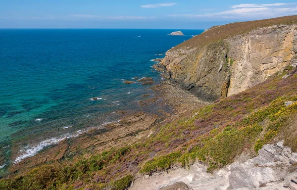 Cotes-d-Armor, France - 25 August 2019: Rocky coast of Cap Frehel is a peninsula in Brittany in northwestern France