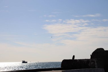 Denizin üzerinde gün batımı