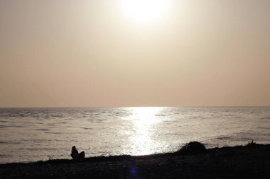  Denizin üzerinde gün batımı