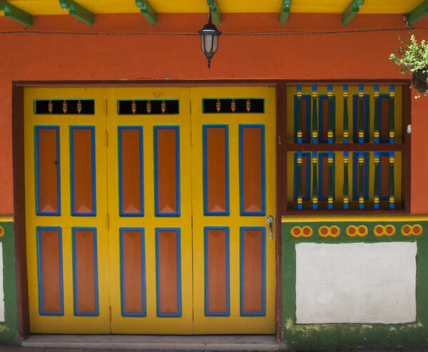 Rustic doors in different colors in a village