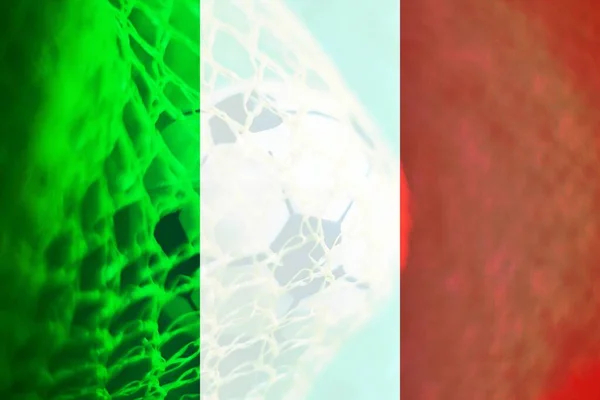 Italian Flag with a soccer ball inside a net as background. Concept of Italian soccer team.