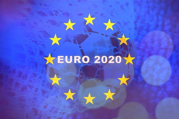 Soccer ball in goal, with the european flag with the text Euro2020 . Concept of european soccer cup.