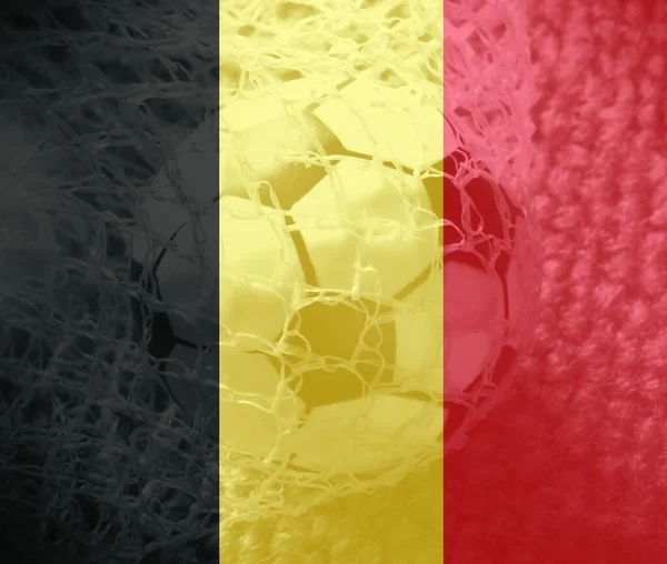 Belgium flag with a soccer ball going inside the net. Concept of Belgium soccer team.