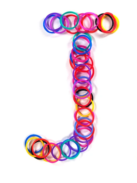 Kolorowe gumki charakter "j". — Zdjęcie stockowe