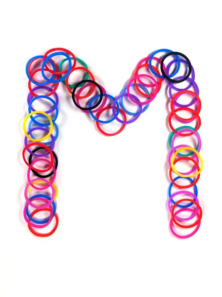 Colorful rubber band character "M". — Stock Photo, Image