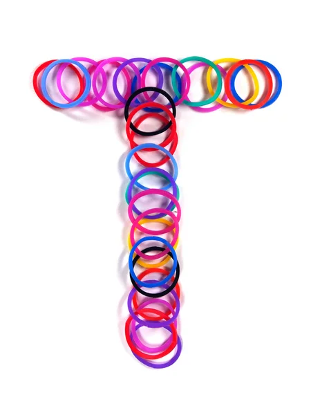 Personaggio elastico colorato "T ". — Foto Stock