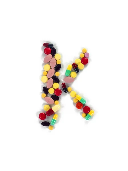 カラフルな薬物アルファベット「K" — ストック写真