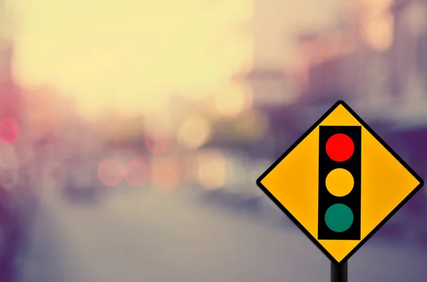 Traffic light sign on blur traffic road abstract background. — Stock Photo, Image