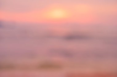 Tropikal günbatımı plaj arka plan bulanıklık.