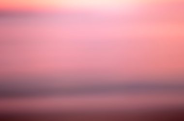 Tropikal günbatımı plaj ile bokeh güneş ışık dalga arka plan bulanıklık. Seyahat kavramı. 