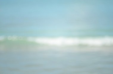 Plaj ile bokeh dalga arka plan bulanıklık.