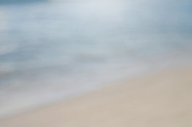 Plaj ile bokeh dalga arka plan bulanıklık.