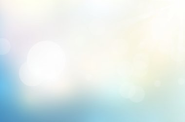 Güneş ışığı ve yumuşak pastel renk arka plan.