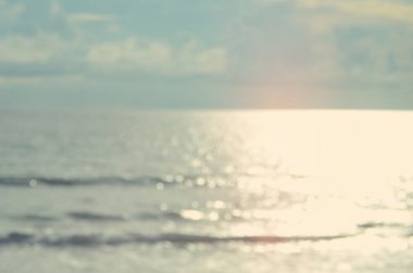 Plaj ile bokeh dalga arka plan bulanıklık.