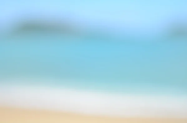 Rozostření tropická pláž s slunce světlo abstraktní pozadí. Cestovní koncept. — Stock fotografie