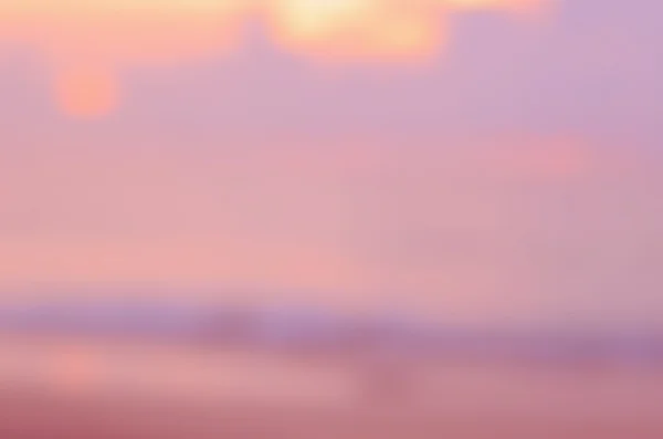 Sfocatura tramonto spiaggia astratto sfondo . — Foto Stock