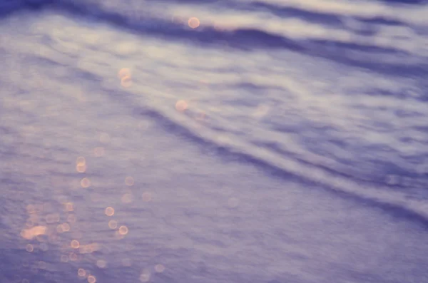 Verschwimmen Bokeh Welle Strand abstrakten Hintergrund — Stockfoto