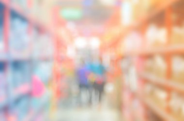 İnsanlar alışveriş süper merkezi alışveriş arka plan bulanıklık.