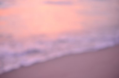 Tropikal günbatımı plaj arka plan bulanıklık.