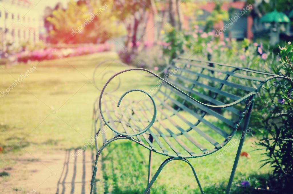 Blur outdoor chair in nature park abstract background. Stock Photo by  ©Tonktiti 94427608