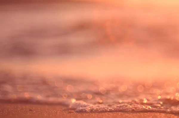 Sfocatura tropicale tramonto spiaggia astratto sfondo . — Foto Stock