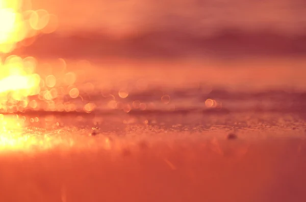 Verschwimmen tropischen Sonnenuntergang Strand abstrakten Hintergrund. — Stockfoto