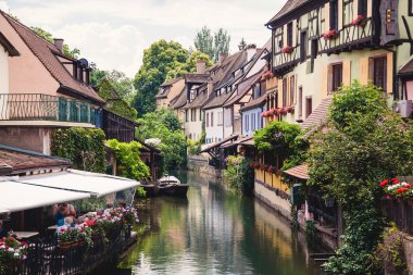 Panoramic view on canal in Petite Venice neighborhood of Colmar, clipart