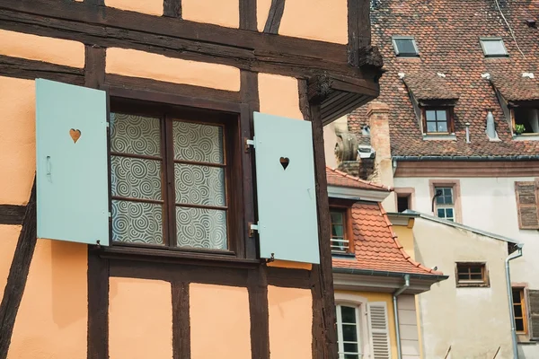 Old half timber (fachwerk) windows on house in Colmar, France. — Stock Photo, Image